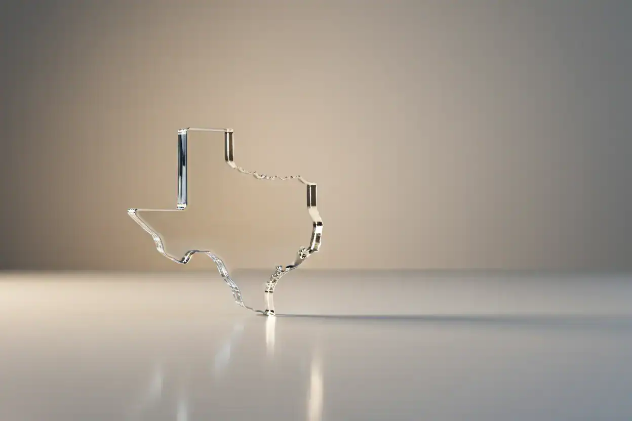 Translucent glass Texas silhouette on a neutral background, symbolizing transparency in employer branding.